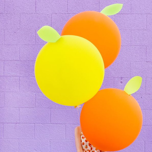 decoracion con globos fruta naranjasa